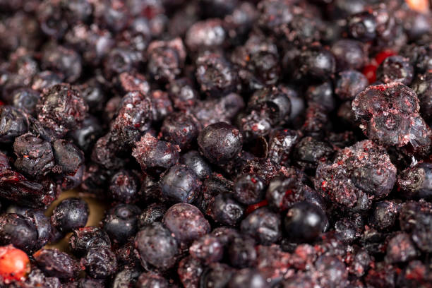 istock various blueberries after freezing are on the table 2161137330