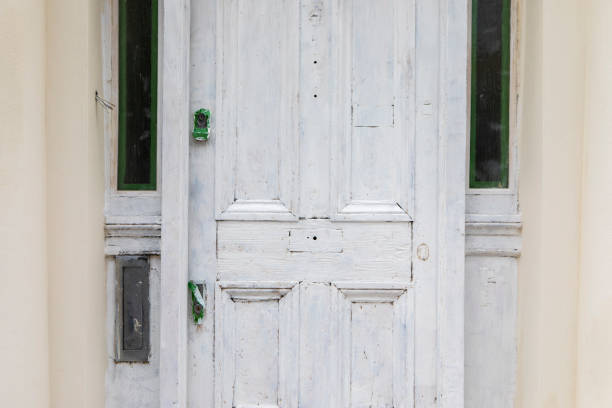 A worn old brown wooden door.