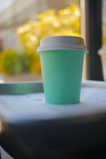 istock Blank take away kraft coffee cup on table , 2161139289