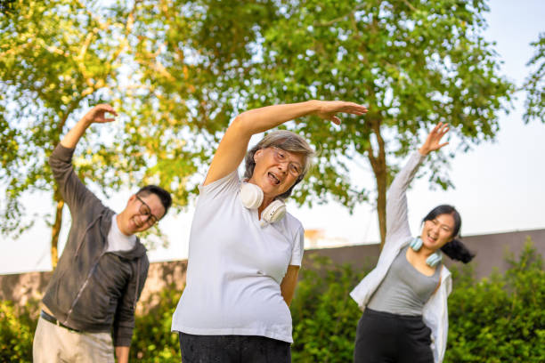 istock Family stretching in the park 2161140346