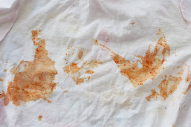 istock A white fabric stained with tomato sauce requires a meticulous cleaning process 2161142174