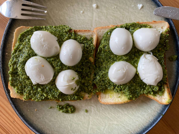Pesto Sauce with Mozzarella Cheese on Toast Bread. Organic Healthy Food.