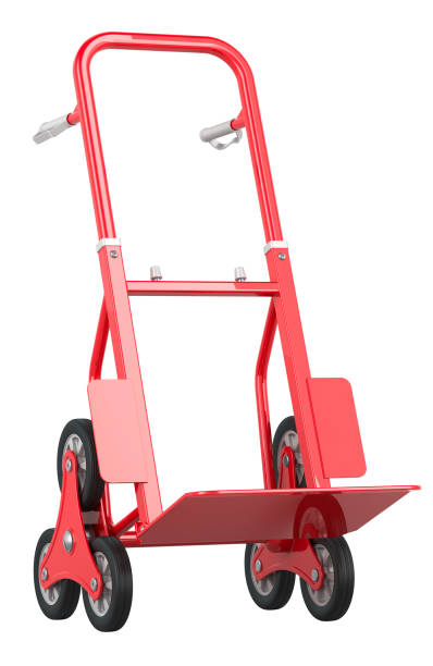 Tires and metal platform of hand truck, top view, on concrete base. Cargo transportation.