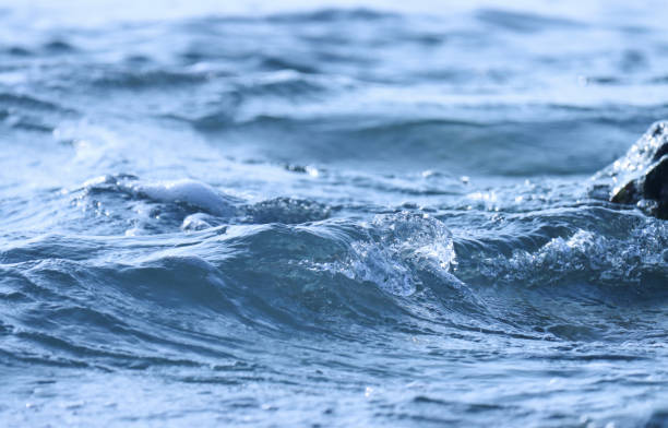 istock Ocean wave on the beach. Blue water. Ocean water. Water background. 2161148153