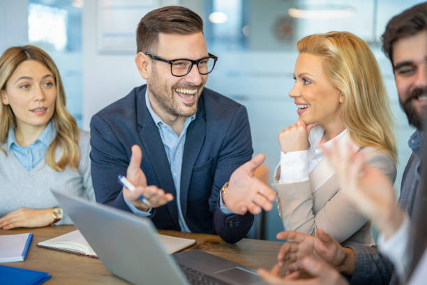 istock Business professionals engage in teamwork, working together on a B2B corporate strategy. 2161148601
