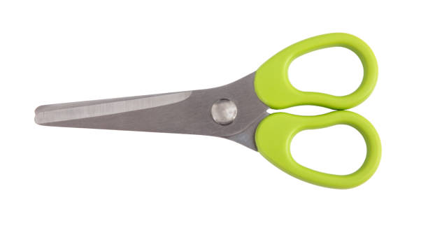 istock School scissors closed, green handle isolated on white, transparent 2161151090