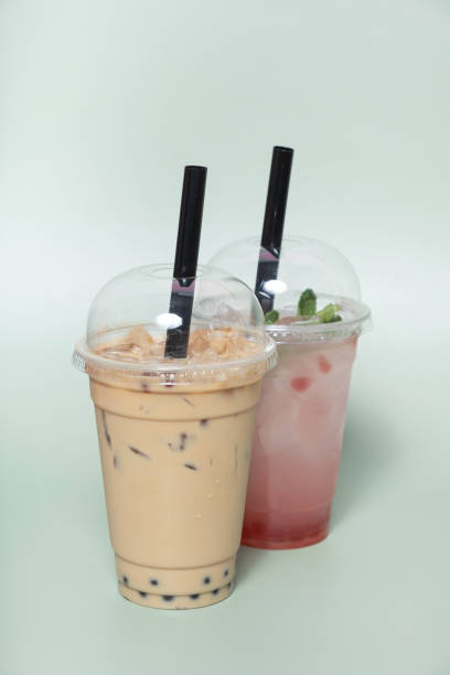 istock Two plastic glasses with iced bubbles tea. Trendy summer drink 2161151577