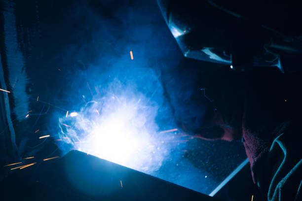 He is welding