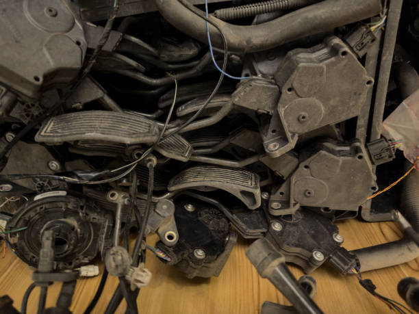 Used Car Pedal Assemblies and Wiring in Scrap Yard