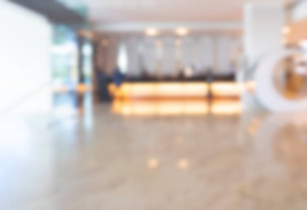istock Abstract blur luxury hotel lobby luxury interior for background, decoration with reception counter with lighting, marble floors. Blurred scene front desk interior design, business travel concept. 2161152916