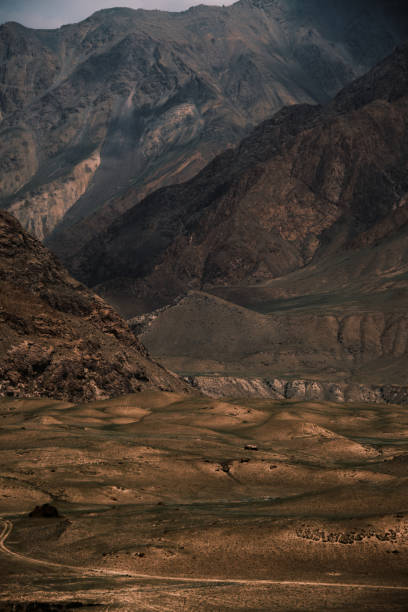Gold-colored mountain landscape with off-road trails
