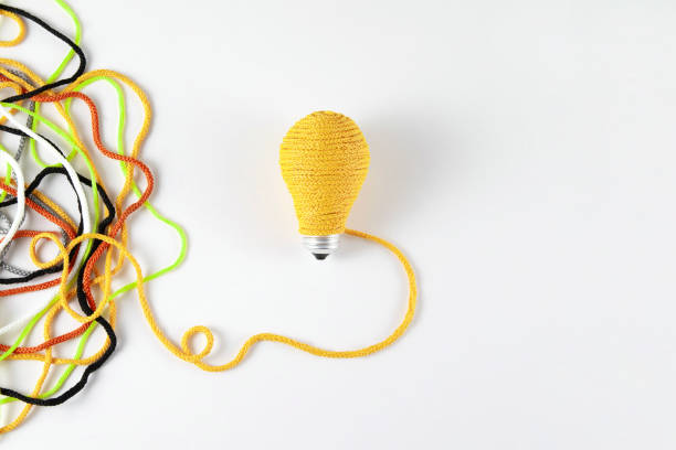New idea concept with ball of yarn as a light bulb and ropes