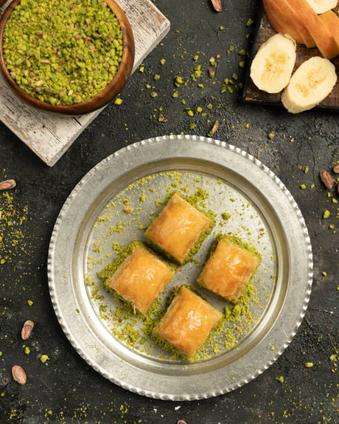 istock Turkish baklava generously garnished with pistachios 2161164404