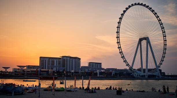 istock ferris wheel at sunset in dubai 2161165846