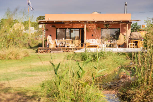 istock Country house behind wild plants. 2161168470