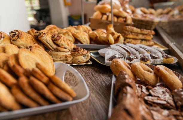 istock Close-up on baked pastry items at a bakery window 2161171711