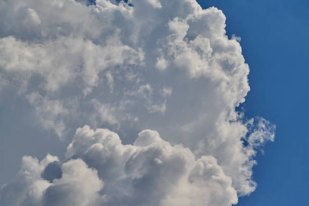 a white cloud in the sky, white cloud soaring in the blue sky close-up