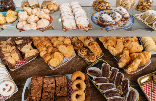 istock Baked pastry items displayed on the window at a bakery 2161172550