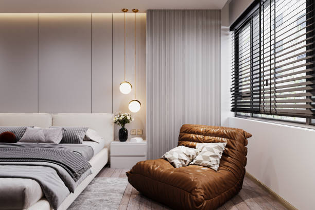istock Bright and cozy modern bedroom with bed, lazy setting leather sofa in the window corner, 3D rendering 2161174708
