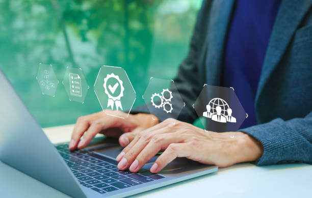 istock Standard quality control certification assurance guarantee concept. Business person working with laptop and approve certificate. Quality assurance QA, Quality control QC, Compliance with regulations, 2161184307