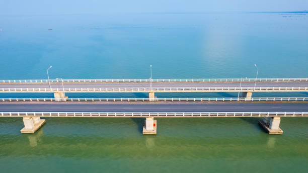 istock Cement bridge across the lake 2161188395