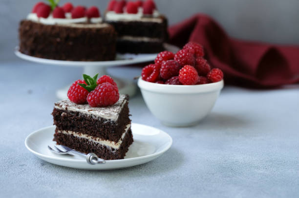 istock chocolate cake with fresh raspberries for dessert 2161190644