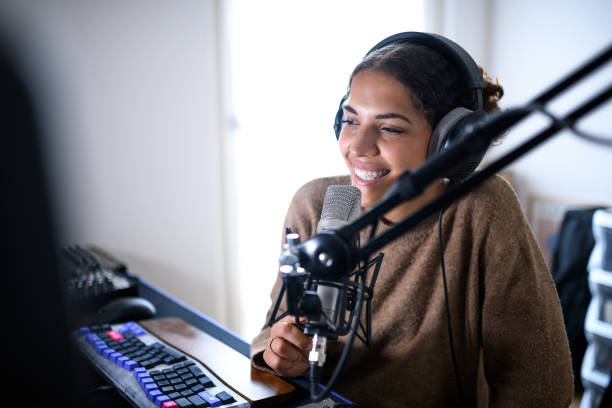 istock Woman recording a streaming podcast 2161191142