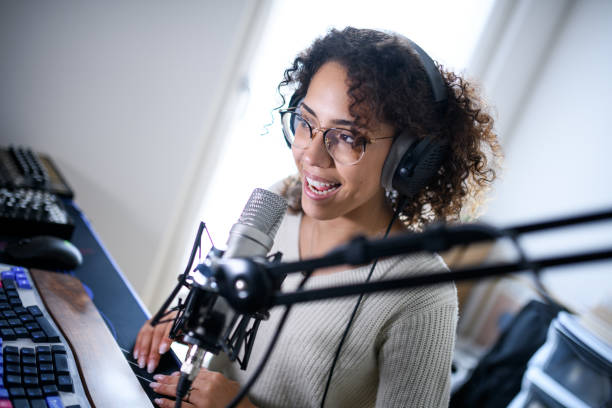 istock Woman recording a streaming podcast 2161191881