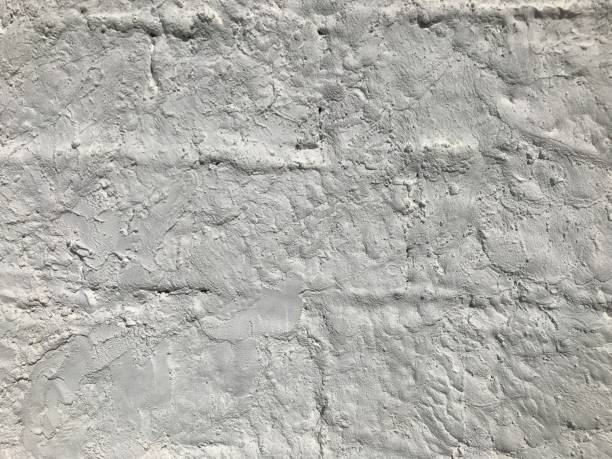 istock White brick. Wall texture. High relief texture. Grooves. wall background 2161194836