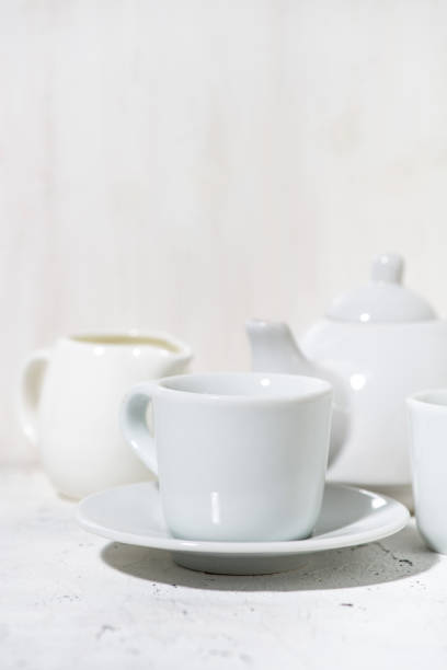 istock white utensils for tea drinking closeup, vertical 2161197028