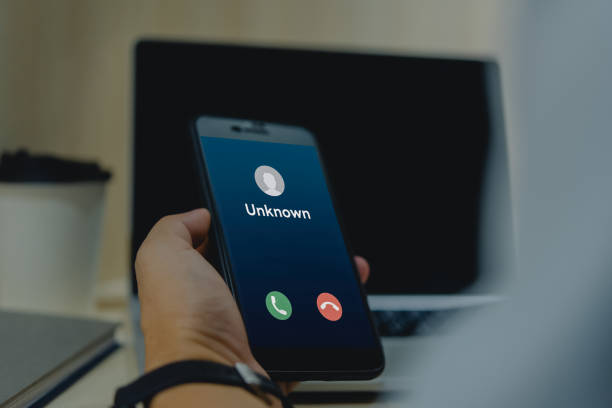 istock Close-up of smartphone with unknown incoming call, emphasizing digital communication. Suitable for tech, security, business themes. 2161206158