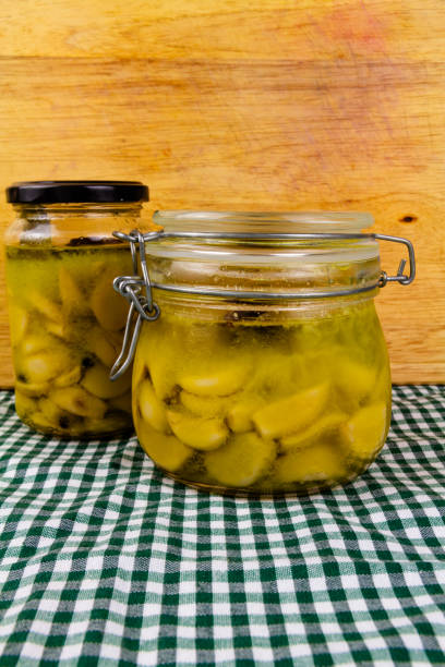 istock Two jars of Garlic Confit, straight from the fridge. 2161211593