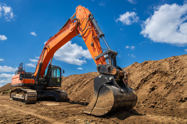 istock A large industrial excavator work on the construction site.  Cloudy sky 2161214081