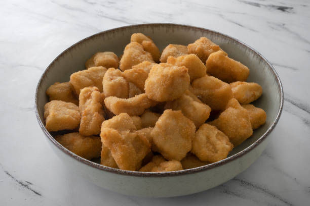 istock Top view of fried fish nuggets 2161216656