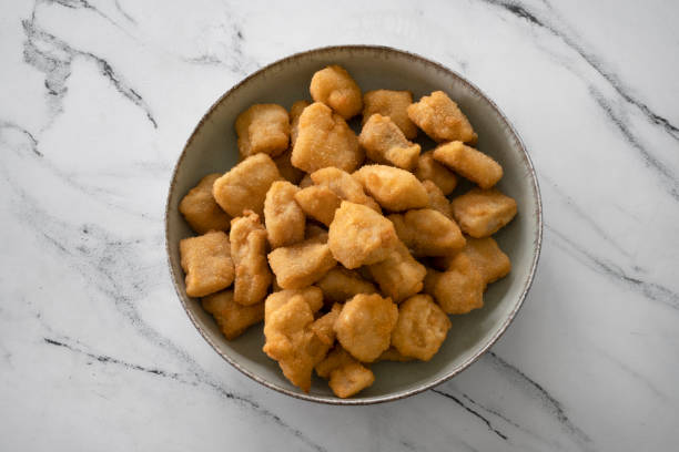 istock Top view of fried fish nuggets 2161216659