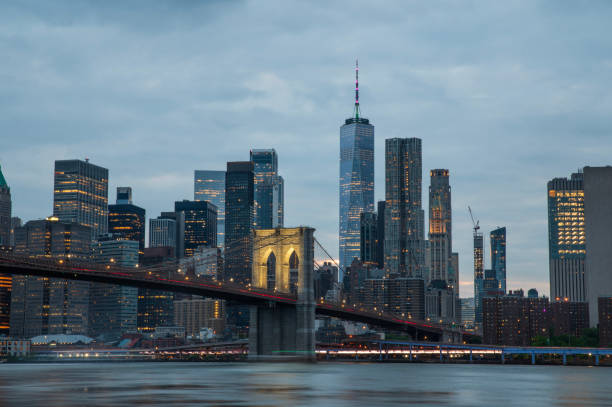 istock Manhattan view at dusk with Brooklyn bridge view 2161221084