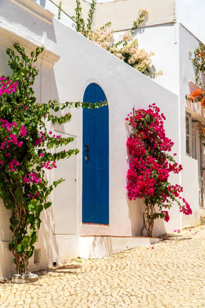 Lagos Portugal, Summer 2024, tourists and locals alike can stroll the busy downtown streets of this historic coastal port town, shopping and sight seeing along the Atlantic ocean. June 22nd 2024