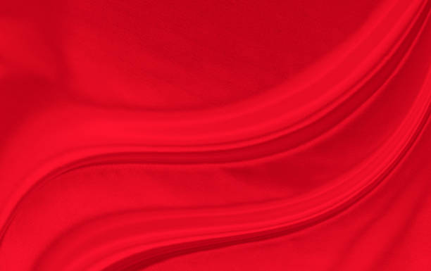 istock Black red satin dark fabric texture luxurious shiny that is abstract silk cloth background with patterns soft waves blur beautiful. 2161221990
