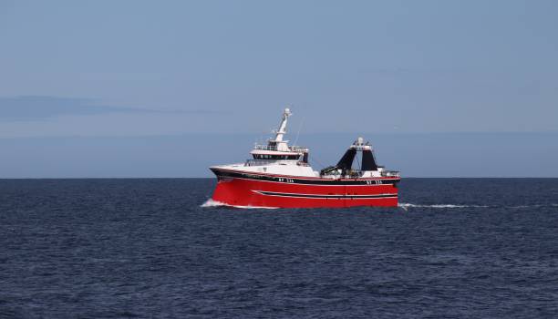 A cutter with lifted drag nets on the North sea