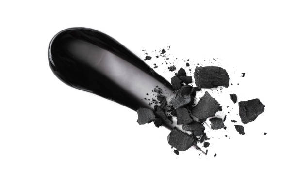 istock Black charcoal face mask smear isolated on white background. 2161223474