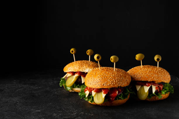 istock Three funny crazy monsters burgers 2161225084