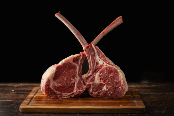istock crossed bones of tomahawk steak 2161225628