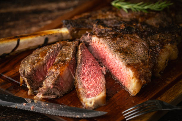 istock sliced rare grilled tomahawk steak 2161227270