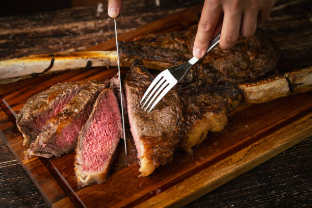 istock sliced rare grilled tomahawk steak 2161227499