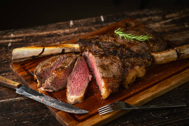 istock sliced rare grilled tomahawk steak 2161227737