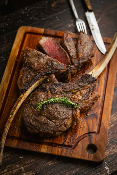 istock sliced rare grilled tomahawk steak 2161227817