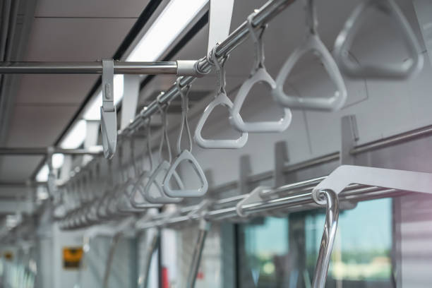 istock Individual handles on metal handrails inside the train. 2161230470