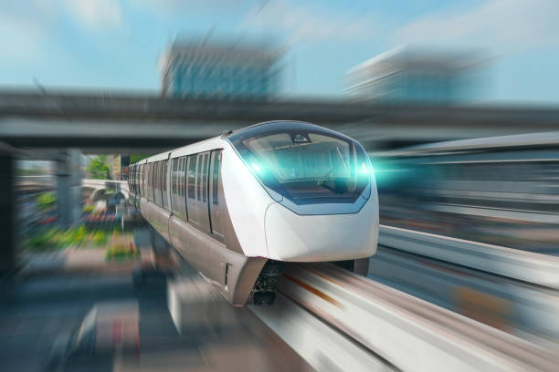 istock Modern high speed monorail train with bright headlights passes race station on the stage through a tunnel at a road junction 2161230521