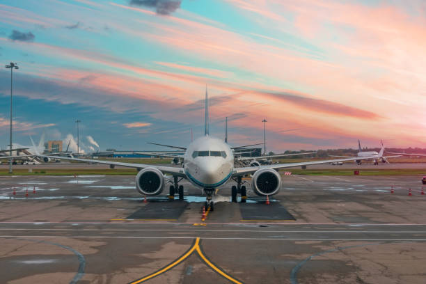 istock Passenger planes parked in the air harbor during dawn sky. 2161232031