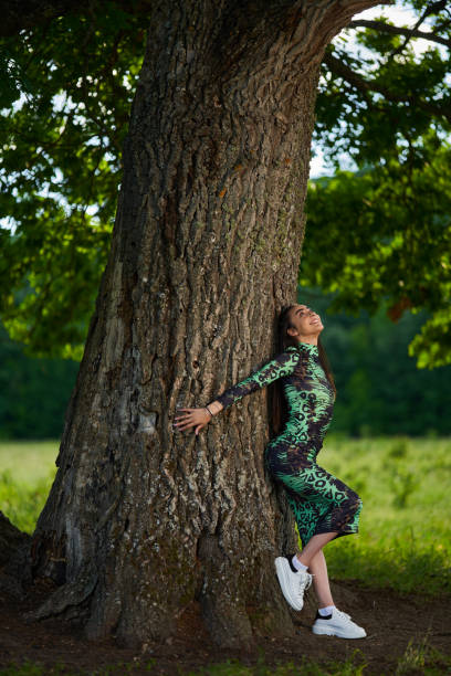istock Beautiful Hispanic woman in oak forest 2161233067